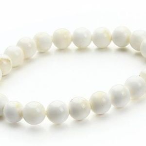 Hand carved white tridacna shell bracelet